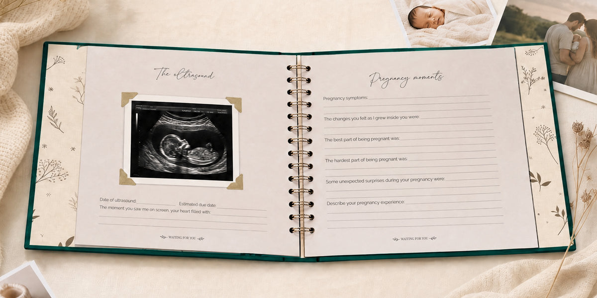 The CheriBOO Baby Memory Book in Evergreen open on the ultrasound page, with printed photos beside it